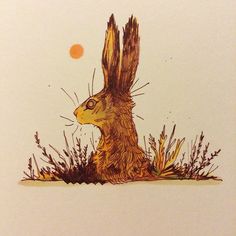 a drawing of a rabbit sitting in the grass