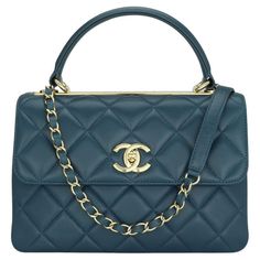 CHANEL Trendy CC Top Handle Bag Small Blue Lambskin with Light Gold-Tone Hardware 2017. This stunning bag is in very good condition, the bag still holds its original shape, and the hardware is still very shiny. This top handle bag is simply gorgeous in so many ways. It can be carried in multiple ways; on your hands, on your shoulder. This bag is functional, practical and easy to use as an everyday companion. - Exterior Condition: Very good condition. Light leather surface wear to the corners. Th Chanel Trendy Cc Bag, Chanel Top Handle Bag, Chanel Trendy Cc, Cc Top, Chanel Top, Trendy Shoulder Bag, Vintage Chanel, Clothing Ideas, Handle Bag