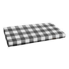 a black and white checkered dog bed on a white background, with the bottom section missing