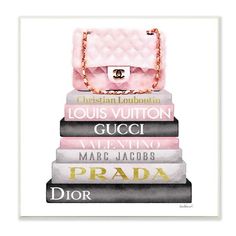 a stack of books with a pink purse on top