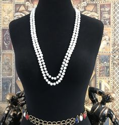 62-inch-long FAUX glass pearl necklace in very good vintage condition.  What's really nice about this length is it is so versatile, and you can wear it so many different ways.  A perfect addition to any wardrobe. d200 Vintage Long Hand-strung Beaded Necklaces, Vintage Hand-strung Long Beaded Necklaces, Vintage Multi-strand Pearl Necklace As Gift, Vintage Multi-strand Pearl Necklace For Formal Occasions, Vintage Multi-strand White Pearl Necklace, Desert Hot Springs, Necklace Vintage, Hot Springs, Faux Pearl