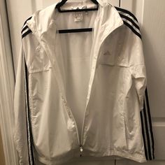 Nwot. White Adidas Windbreaker Jacket. Never Worn. Nice Reflective Design On The Top Of The Jacket. Super Soft And Great Quality. Size Large. Adidas Windbreaker Jacket, White Adidas Windbreaker For Spring, White Long Sleeve Sports Outerwear, White Adidas Hooded Windbreaker, White Hooded Adidas Windbreaker, Adidas White Windbreaker For Sports, Adidas White Outerwear For Spring, White Adidas Outerwear For Spring, White Long Sleeve Windbreaker For Fall