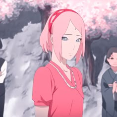 an anime character with pink hair standing in front of other characters wearing black and white