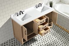 a bathroom with two sinks and a bathtub next to it on a tiled floor