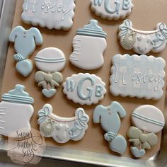 decorated cookies in the shape of baby's first year