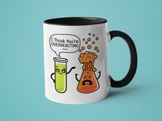 a black and white coffee mug with an image of two beaks, one containing chemicals and the other saying think you're overrefecting