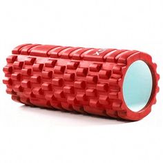 a red foam yoga roller on a white background