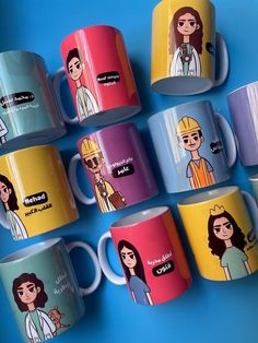 many different colored coffee mugs with cartoon characters on the inside and outside of them