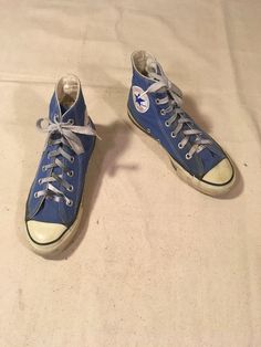 "1980s Converse Chuck Taylor All Star hi-top sneakers made in USA blue label on insole cornflower blue canvas rubber sole (white/dark blue line) cushion insole w/arch support good vintage condition, light wear missing instep rivet/glue bleed above sole guard/laces wear/heel/sole wear(see photos) label size 4 1/2, equivalent to women's 6 to 6 1/2, please go by measurements measurements, insole-9 1/2\" sole-10\" width-3 1/2\" heel-1 1/4\" height-5 1/2\"" Vintage Canvas Shoes With Rubber Toe Cap For Streetwear, 80s Converse, Vintage High-top Sneakers With Vulcanized Sole, Blue Canvas High-top Sneakers With Gum Sole, Vintage Sneakers With Rubber Toe Cap, Vintage Canvas Shoes With Rubber Sole For Streetwear, Blue Cotton Sneakers With Gum Sole, 80s Items, Retro Cotton High-top Sneakers With Round Toe