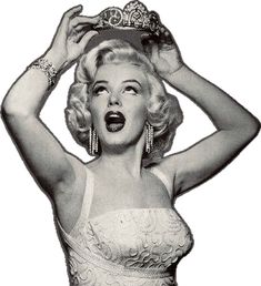 a black and white photo of a woman in a dress with a tiara on her head