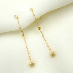 14K Solid Gold and Diamonds Stars Dangle Earrings HIGH QUALITY DANGLE EARRINGS This modern and on-trend design is crafted from genuine 14k Solid Gold and Diamonds! Item number: GDT60-EFB51689 Length Size: 36mm Thickness: 1.7mm Closure: Butterfly Metal: 14k Solid Gold Purity: 14K (Stamped for Authenticity) Processing time: 1-2 business days FAST SHIPPING Gold Jewelry Store NY sells only authentic solid 14K Gold. We do not sell gold plated or gold-filled jewelry. They are unique and pair perfectly Elegant Dangle Earrings With Star Charm, Elegant Yellow Gold Earrings With Star Charm, Elegant Star-shaped Jewelry With Dangling Charms, Earrings Star, Gold Jewelry Stores, Jewelry Chain, Earrings Diamond, Sell Gold, Diamond Star