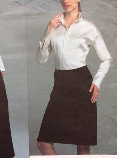 "Misses' Shirt, Skirt and Pants: Close-fitting shirt has buttoned front, front and back darts, extended shoulders, cuffs and fold-back collar. Collar and cuffs have hidden buttonhole and button. A-line skirt has back zipper, waistline facing, front and back edges butting with topstitching detail. High waisted pants are 1\" above waist with back zipper, front and back darts. Pattern is cut to size 18. Some wear to envelope, as shown. See photos for more measurements and fabric recommendations. Da Fitted Buttoned Formal Skirt, Formal Fitted Skirt With Button Closure, Formal Fitted Skirt With Buttons, Formal Button-up Bottoms, Elegant Fitted Blouse With Pockets, Fitted Blouse With Set-in Sleeves For Work, Elegant Button-up Office Bottoms, Elegant Button-up Bottoms For Office, Elegant Button-up Bottoms For Fall