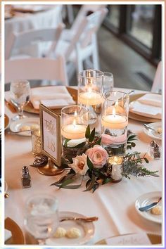 Looking for picture-perfect wedding table decorations? Check out these 8 stunning ideas and tips to create a memorable reception. From elegant centerpieces to creative place settings, we've got you covered. Get inspired and make your special day truly unforgettable with these wedding table decoration ideas. Centerpiece Wedding Round Table, Romantic Candlelight Dinner, Wedding Party Centerpieces, Romantic Candle Light Dinner, Floating Candle Centerpieces, Simple Wedding Centerpieces