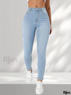 Bjux - Womens High-Waisted Blue Skinny Jeans with Slim Fit, Mid-Stretch Fabric, and Slant Pockets - Modern and Stylish Denim Apparel Slim Stretch Blue Bottoms, Solid Fitted Denim Jeans, High Waist Slim Fit Denim Blue Bottoms, High Waist Denim Blue Jeggings With Pockets, High-waisted Denim Blue Jeggings With Pockets, Denim Blue High Waist Jeggings With Pockets, High Waist Denim Jeggings For Spring, Fitted High Waist Solid Color Jeans, Slim Stretch Denim Blue Bottoms