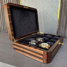 Handmade Ebony Watch Box - 12 Watch Luxury Storage Box    Step into quality with our handmade ebony wood watch box. Designed to display and protect your precious 12-hour collection, this box reflects the perfect harmony of ebony natural wood veneer, fabric, matt lacquer and chrome titanium finish.      Superior Craftsmanship:   Our large watch boxes are carefully handcrafted by artisans, each one a work of art.  Unique Wood Patterns: Due to the natural wood grain of ebony wood, the surface appea Wood Watch Box, Wooden Watch Box, Luxury Storage, Watch Organizer, Handmade Watch, Watch Display, Beautiful Pen, Box Handmade, Handmade Box