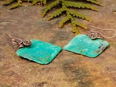 "These are so cool. The look like they came out of a box of treasure sunk in the sea. These have a light green verdigris green patina and then wire wrapped in beautiful copper. The color and texture are simply incredible. Beautiful squares and very light to wear. A wonderful gift for Mother's Day! These rustic squares were hand sawed using a jeweler's saw, out of copper sheet. There were then hammered with a textured hammer. I wire wrapped them and then placed them in a green chemical patina for Metal Earrings With Patina For Gift, Patina Metal Earrings As A Gift, Patina Drop Earrings As Gift, Rectangular Patina Jewelry As Gift, Boho Wedding Earrings, Patina Copper, Green Patina, Copper Sheets, Copper Patina