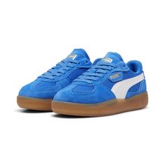 Straight From Our Archives, It's The Puma Palermo. This Classic Terrace Shoe Debuted In The 80's And Now, We've Brought It Back For The Fans. With Its Signature T-Toe Construction And Classic Gum Sole, This Version Features A Textile Upper With A Synthetic Puma Formstrip, Suede Overlays, And A Semi-Transparent Rubber Tooling. Features & Benefits Puma's Leather Products Support Responsible Manufacturing Via The Leather Working Group: Www. leatherworkinggroup. com Details Regular Fittextile Uppersuede Overlaysmesh Lininglace Closuresemi-Transparent Rubber Midsole And Outsolesynthetic Puma Formstrippuma Branding Details | Sneakers Heels, Cute Sneakers, Shoe Inspo, Blue Sneakers, Sneakers Blue, School Shopping