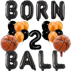 some balloons that say born to 2 ball and are black with orange, gold and silver balls