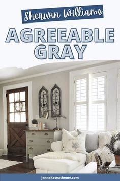 a living room with white furniture and wood floors, the title says shewn williams's agreeable gray