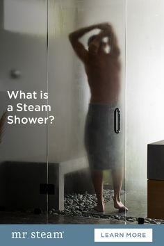 a man standing in front of a shower with the words, what is a steam shower?