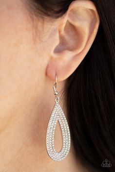 Three glittery rows of glassy white rhinestones coalesce into a sparkly silver teardrop, creating a dramatically dazzling statement piece. Earring attaches to a standard fishhook fitting.

 Sold as one pair of earrings. Bling Earrings, Jewelry Watch, Sparkle Necklace, Fish Hook Earrings, Paparazzi Accessories, White Rhinestone, Paparazzi Jewelry, How To Show Love, White Earrings