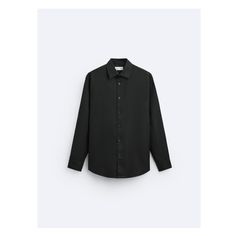 Regular fit shirt with spread collar and long sleeves with buttoned cuffs. Front button closure.