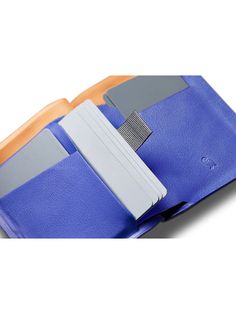 Our classic Note Sleeve billfold, reimagined with pre-molded leather, stitchless construction, and one-handed magnetic closure. To keep this wallet as slim as possible, we’ve joined the layers of leather using heat bonding, rather than bulky stitching. The snappy magnetic closure keeps your stuff secure, helps maintain a slim silhouette and feels incredibly satisfying! To balance access with capacity, we paired two quick-draw card slots, and two bulk storage pockets. The flat bill section is siz Modern Wallets With Magnetic Closure, Functional Leather Bifold Card Holder, Functional Leather Trifold Wallet With Card Slots, Modern Trifold Wallet For Daily Use, Blue Trifold Wallet For Business With Interior Card Slots, Blue Trifold Wallet With Interior Card Slots, Blue Trifold Wallet With Interior Card Slots For Business, Blue Leather Trifold Wallet With Card Slots, Functional Leather Trifold Wallet