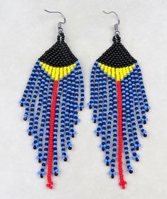 These gorgeous earrings are designed and produced in Kwazulu-Natal South Africa.  Each piece is carefully hand sewn. Blue Dangle Earrings With Black Beads, Adjustable Blue Earrings With Black Beads, Unique Blue Jewelry With Black Beads, Unique Blue Earrings With Colorful Beads, Elephant Keychain, Steel Gifts, Kwazulu Natal, Earrings Blue, Feather Earrings