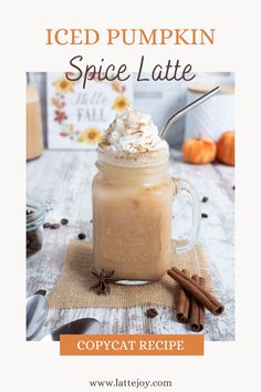 an iced pumpkin spice latte in a mason jar