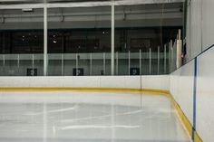 an empty hockey rink with no people on it