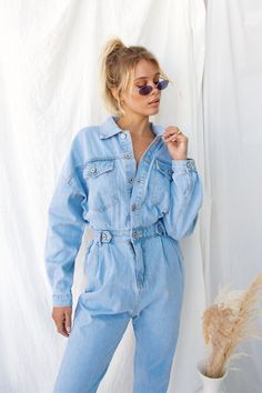 Size Recommendations & Material: - Light wash denim jumpsuit - Button closure in front - Elastic waist - Ankle fit - Model wears size Small/Medium - Approximately 53" from shoulder to hem - Approximately 25" inseam - Approximately 16" from arm hole to wrist - 100% Cotton - Hand Wash Cold Model Details: - Allie is 5'7 - Bust: 32B - Waist: 25" - Wearing size Small/Medium Return Policy: We offer refunds & exchanges within 15 days of purchase with tags attached & in original, unworn cond Denim Jumpsuit Outfit Casual, Jean Jumpsuit Outfit, Denim Jumpsuit Outfit, Denim Photoshoot, Beige Crop Tops, The Perfect Date, Perfect Date Night, Denim Outfits, Jumpsuit Outfit