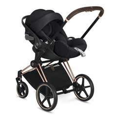 the buggy stroller is shown in black and gold