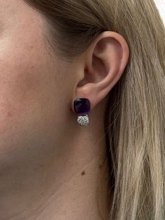 Pair of 18k gold Pomellato Nudo earrings, with amethyst and approx. 0.90ctw G/VS diamonds. Brand new, old stock. Just purchased inventory of a high end boutique in Europe. All retail prices displayed on the items are from the early 2000s. Current retail prices are significantly higher. DESIGNER: Pomellato MATERIAL: 18k Gold GEMSTONES: Diamond, Amethyst DIMENSIONS: Earrings are 23mm x 12.5mm. MARKED/TESTED: Pomellato, 750. WEIGHT: 19.5 grams CONDITION: Brand New/ Store Sample Luxury Purple Earrings For Evening, Formal Purple Diamond Earrings, Luxury Amethyst Earrings For Formal Occasions, Elegant Amethyst Earrings For Formal Occasions, Luxury Purple Earrings For Anniversary, Amethyst Earrings Fine Jewelry For Formal Occasions, Luxury Purple Sterling Silver Earrings, Elegant Purple Jewelry With Pave Setting, Luxury Purple Round Earrings