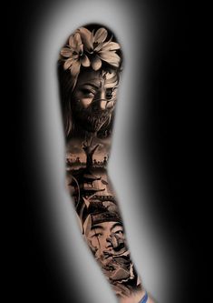 a man's arm covered in tattoos with pictures of people and flowers on it