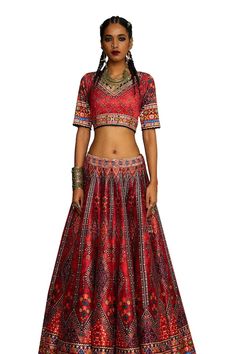 Red V-neck blouse with tribal print and threads, beads embroidery. Paired with coordinating lehenga and dupatta. - Aza Fashions Traditional V-neck Choli With Intricate Embroidery, Traditional Silk V-neck Choli, Red V-neck Choli With Zari Work, Red V-neck Navratri Sets, Bollywood Style Red V-neck Choli, Red V-neck Sets For Navratri, Red V-neck Bollywood Choli, Traditional V-neck Choli With Resham Embroidery, Traditional V-neck Lehenga For Festive Occasions