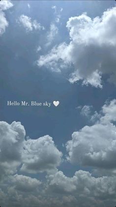 the sky is filled with white clouds and there is a heart in the center that says hello mr blue sky