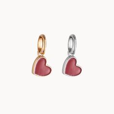 Each adorable Mini Red Heart Charm radiates warmth and affection. Perfect for Valentines Day and beyond, this charm can easily be added to most Merci Maman chains as an extra touch of love to every necklace.&nbsp;18K Champagne Gold Plated or 925 Sterling SilverCharm size: &nbsp;0.24 x 0.21Charms can be worn on all Merci Maman chain lengthsSent with love in a complimentary gift box Dangling Pendant Charms For Valentine's Day, Valentine's Day Pendant Charms With Dangling Details, Valentine's Day Dangling Charms Pendant, Red Dainty Charm Necklace With Heart Charm, Valentine's Day Heart Pendant Dangling Charms, Rose Gold Heart-shaped Charm For Gift, Valentine's Day Heart-shaped Dangling Charms, Red Heart-shaped Sterling Silver Charm Necklace, Heart Pendant Charms With Lobster Clasp