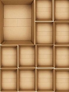 an open cardboard box with many compartments