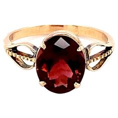 Oval cut garnet is mounted in 14K yellow gold. Beautifully hand crafted ring is suitable for your everyday wear. Carefully chosen gem stone is hand cut and polished. One of a kind ring to suit your style. Its sleek and comfortable to wear. Images are enlarged. Weight of gem: Approximately 2.65 carat Size of gem : 6 mm X 8 mm Yellow Gold Solitaire Ring, Yellow Gold Solitaire, Gold Solitaire Ring, Gem Stone, Solitaire Ring, Oval Cut, Garnet, Jewelry Rings, Everyday Wear