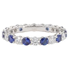 Tiffany & Co. Embrace Sapphire and Diamond Eternity Band Ring Set in Platinum Stones: Diamonds - 11 = 0.85ctw Color - D-F Clarity - VS + Sapphires - 11 = 1.10ctw Color - Vivid Blue Clarity - Eye Clean Ring: Metal - Platinum Weight - 4.6 Grams Finger Size - US 7 / Can Not Be Resized Tiffany 1837 Ring With Sapphires, Clean Rings, Eternity Band Ring, Tiffany And Co, Eternity Band Diamond, Diamond Eternity, Ring Set, Sapphire Diamond, Eternity Bands