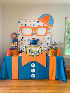 the table is set up for a birthday party