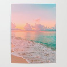 an ocean scene with waves crashing on the beach and clouds in the sky at sunset