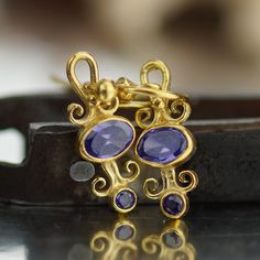 These exquisite Ancient Roman Art Handcrafted Small Amethyst  Earrings are meticulously made by the skilled artisans at Makeitbylove Workshop in Bodrum, Turkey. Crafted with attention to detail, these earrings showcase the beauty of ancient Roman art. The earrings measure 26 mm  in length, 7 X 5 mm in width, and have a weight of 2.86 grams. They are adorned with sparkling amethyst gemstones, adding a touch of elegance About Us: At Makeitbylove, we are passionate jewelry designers based in Bodrum, Turkey. Our workshop specializes in creating handcrafted Turkish jewelry that captures the beauty and craftsmanship of ancient art. We are dedicated to delivering exceptional quality pieces that showcase the rich cultural heritage of our region. Customization Options: We offer customization option Elegant Round Earrings With Artistic Design, Elegant Brass Earrings With Artistic Design, Gold Teardrop Earrings With Artistic Design, Gold Sterling Silver Earrings With Artistic Design, Elegant Hand Forged Adjustable Earrings, Elegant Adjustable Hand Forged Earrings, Artisan Earrings With Artistic Design As A Gift, Artisan Earrings With Artistic Design For Gift, Handmade Artisan Earrings For Anniversary