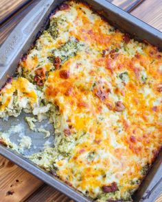 a casserole dish with broccoli and cheese