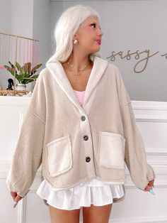 Meet the Vanilla Mocha Cardigan from Sassy Shortcake! This dreamy cream oversized cardigan is the perfect blend of comfort and style. With its cozy fit, you'll feel like you're wrapped in a soft cloud all day long. The generous front pockets make it easy to keep your essentials close at hand. Whether you're lounging at home with a good book or heading out for a coffee date, this cardigan is your go-to extra layer. fits true to size, model wearing a size small content: 100% polyester care: hand w Cozy Outerwear With Soft Texture And Relaxed Fit, Cozy Super Soft Outerwear, Cozy Relaxed Fit Outerwear With Soft Texture, Comfy Oversized Outerwear With Soft Texture, Cozy Fitted Super Soft Outerwear, Soft Texture Cozy Fit Cardigan For Loungewear, Soft Textured Cardigan With Cozy Fit For Loungewear, Cozy Solid Color Cardigan For Loungewear, Cozy Fit Soft Texture Cardigan For Loungewear