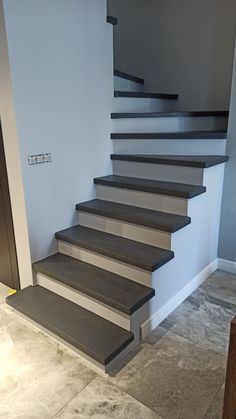 a set of stairs leading up to the second floor