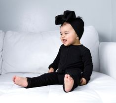 Our newest "Black solid" made from the softest and most breathable bamboo viscose material, your babe won't want to take this off! Designed for all the love and extra snuggles! Sleep and play with zero irritation with our tag-less garment tags! Can't miss our fold over hand cuffs and footie option for the perfect transition to sleep! Easy diaper changes, you got it-made with a double zipper feature. We promise you'll love it! All dreamyZzz items are snug fit to meet CPSC compliance Sizes availab Soft Fitted Onesie For Playtime, Black Fitted Onesie For Loungewear, Soft Fitted Onesie For Loungewear, Playful Fitted Black Onesie, Black Fitted Playful Onesie, Fitted Onesie For Sleep, Fitted Black Onesie For Playwear, Fitted Solid Color Onesie For Sleep, Fitted Black Onesie For Playtime