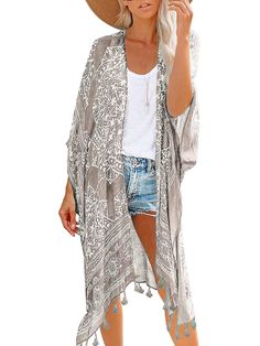 PRICES MAY VARY. Material: This kimono coverup is made of 100% viscose,super lightweight and breathable Measurements: Length - 37.4in/95cm. Width - 35.4in/90cm,one size fits most, perfect for any body type Design:Classic open front design with half sleeves and tassel,unique grey print plus soft fabric,highlight the different and flowy of this beach kimonos Occasions: This women cover up not only suit for beach,but also for daily wear in spring and summer,match well with swimwear ,jeans ,T-shirts Beach Veil, Kimono Beach Cover Up, Beach Cardigan, Coverup Swimsuit, Summer Cardigan, Chiffon Fashion, Bathing Suit Cover Up, Ethnic Print, Womens Kimono