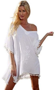 "KAYMI Organic Gauze Cotton Cover Up Resort Kaftan Dress The KAYMI cover up top is constructed with the finest Gauze Organic Cotton. Soft and Cool fabric texture. Bring a tropical flair to your favorite beach attire or perfectly pool side.with this cover up. Loose and flowing kimono silhouette. features feminine embroidery lace and decorative fringe trim throughout. Slip-on design. V-neckline. Draped sleeves. Relaxed fit . lightweight breathable tissue . Tasseled straight hemline. This is ONE SI Kaftan Tunic, Draped Sleeves, Beach Attire, Retro Tops, Drape Sleeves, Pool Side, Women's Cover Up, Embroidery Lace, Kaftan Dress