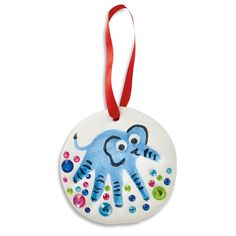 a ceramic ornament with an elephant painted on it